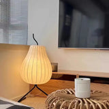 Lampe de table moderne à rayures fines en forme de poire blanche