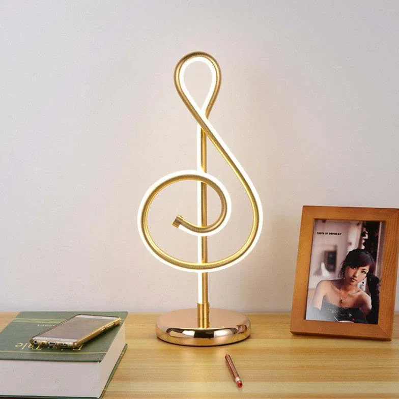 Lampe de table créative de note de musique dorée