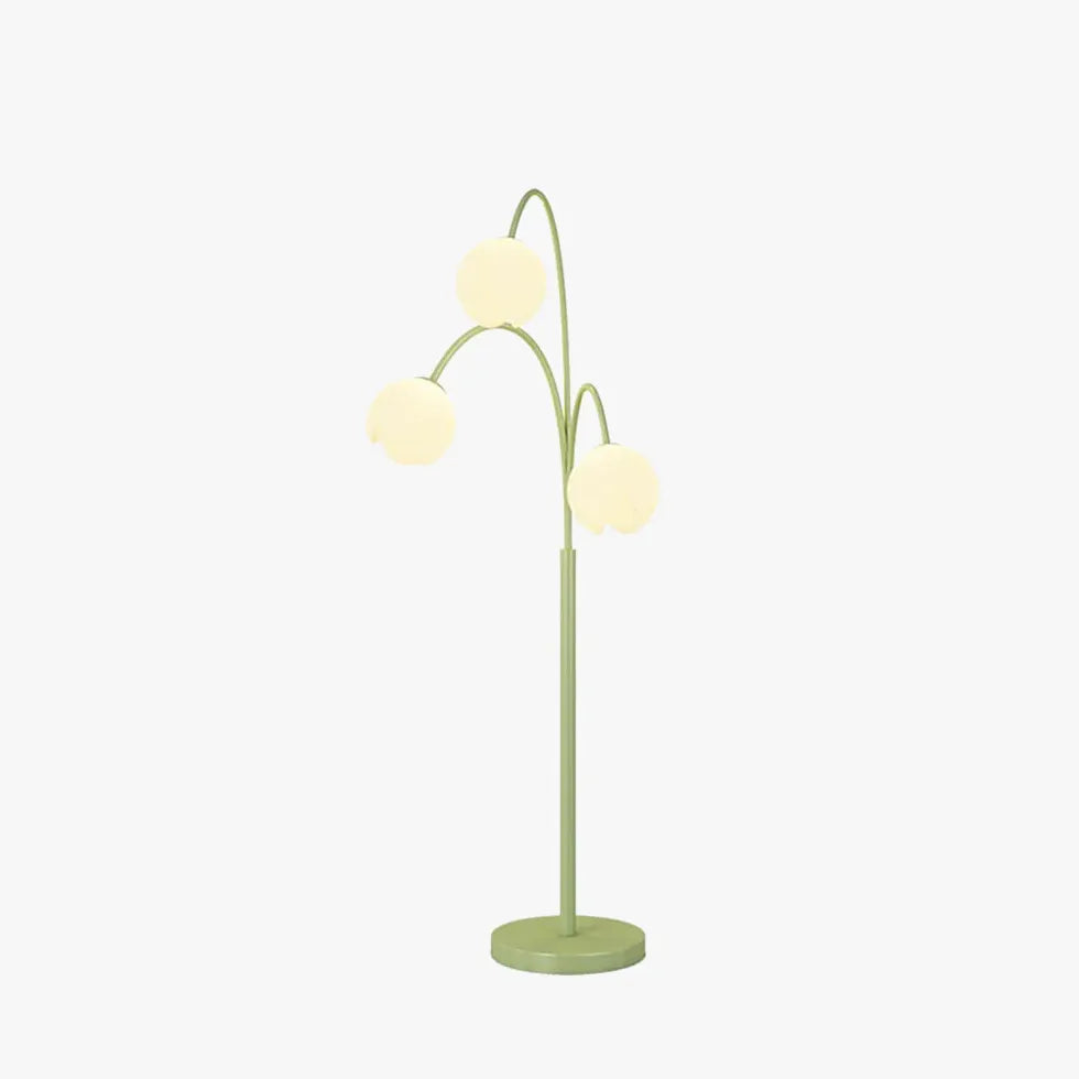 Lampadaire vert à fleurs blanches à trois têtes