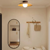 Spherical Warm-Toned Ceiling Light for Corridor