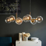 Lustre de salon multi-boules en verre transparent