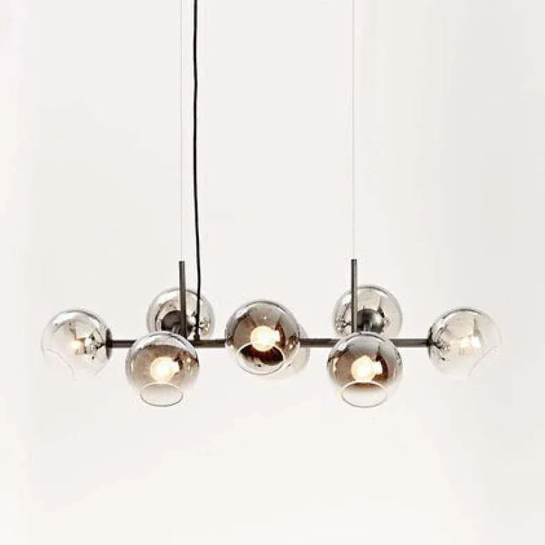 Lustre de salon multi-boules en verre transparent